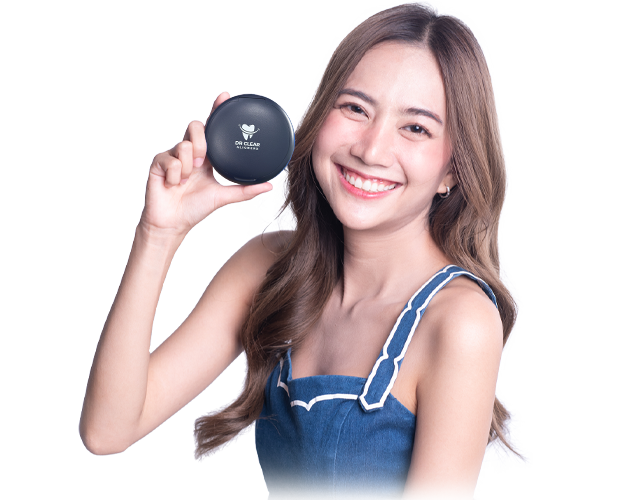 Smiling woman holding Dr Clear Aligners case, symbolizing confidence and lifetime smile guarantee in Malaysia