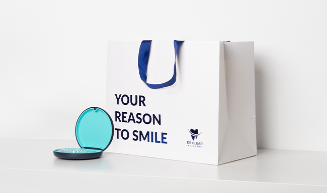 Dr Clear Aligners carry bag and aligner case symbolizing activation of lifetime guarantee